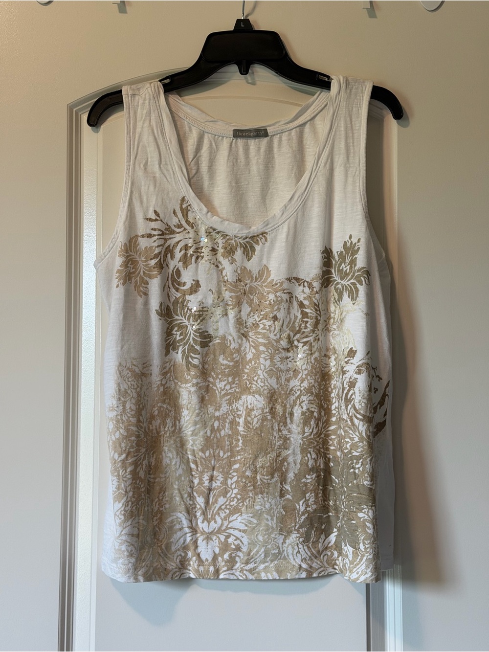 white tank top with gold floral print and sequins